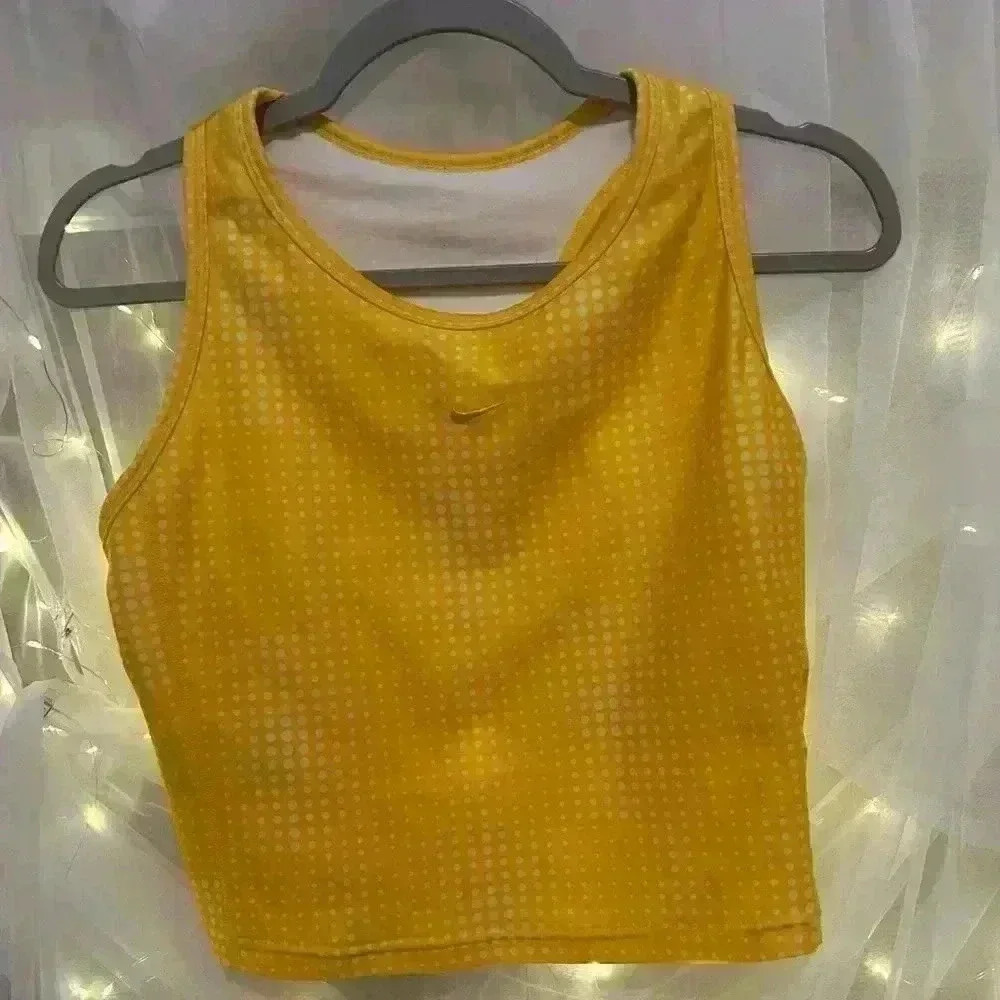 Nike Women’s Tank Top with Bra. No size Tag. Small by measurement. Bust 32”.